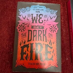 We Set the Dark on Fire hardcover Book
